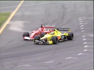 Barrichello and Frentzen touch.