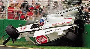 Villeneuve's car hits the barrier in the accident fatal to a track marshall.