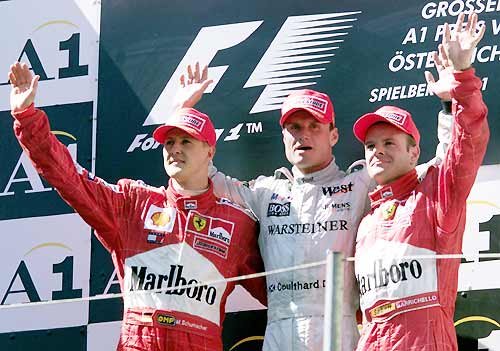 The podium: Coulthard, M. Schumacher and Barrichello