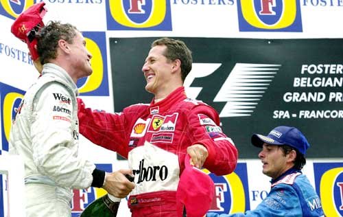 The podium. M. Schumacher, Coulthard and Fisichella.