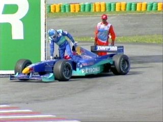 Alesi stops by the side of the track and retires