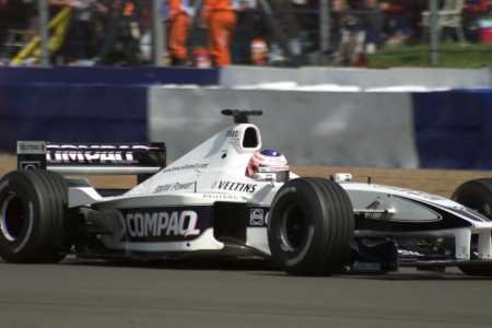 Young driver Button kept Championship leader M. Schumacher behind.