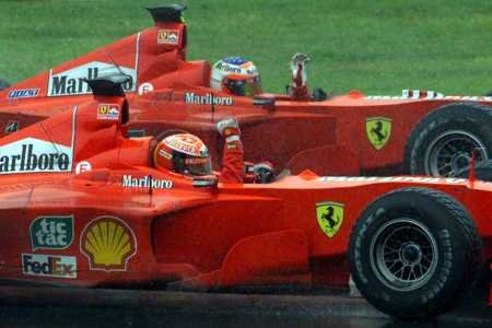 M. Schumacher and Barrichello salute the fans after the victory