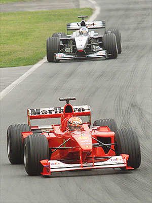 M. Schumacher and Coulthard get away leaving the pack behind