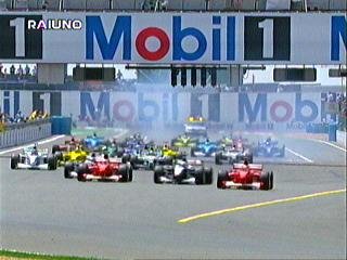 The start. M. Schumacher and Barrichello take first and second position