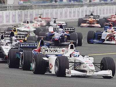 The start. Barrichello takes the lead in front of Alesi.