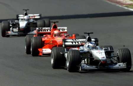 M. Schumacher is sandwiched between the two McLaren.