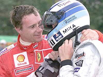 True sportman Irvine congratulates Hakkinen on his victory and Championship.