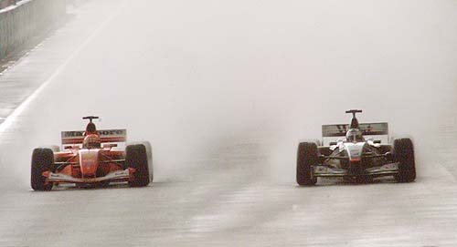 M. Schumacher flies past Coulthard, who knows that his car is no match and does not fight back.