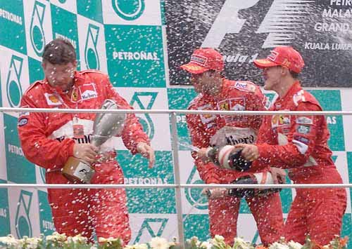 Ferrari celebrate another victory.