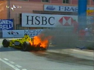 Trulli's car goes up in flames