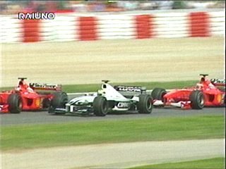M. Schumacher blockes his brother and lets Barrichello go past.