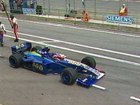 Villeneuve stalls at the pits and retires