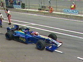 Villeneuve stalls at the pits and retires